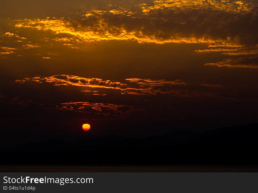 A sunset with piles of  clouds. A sunset with piles of  clouds.