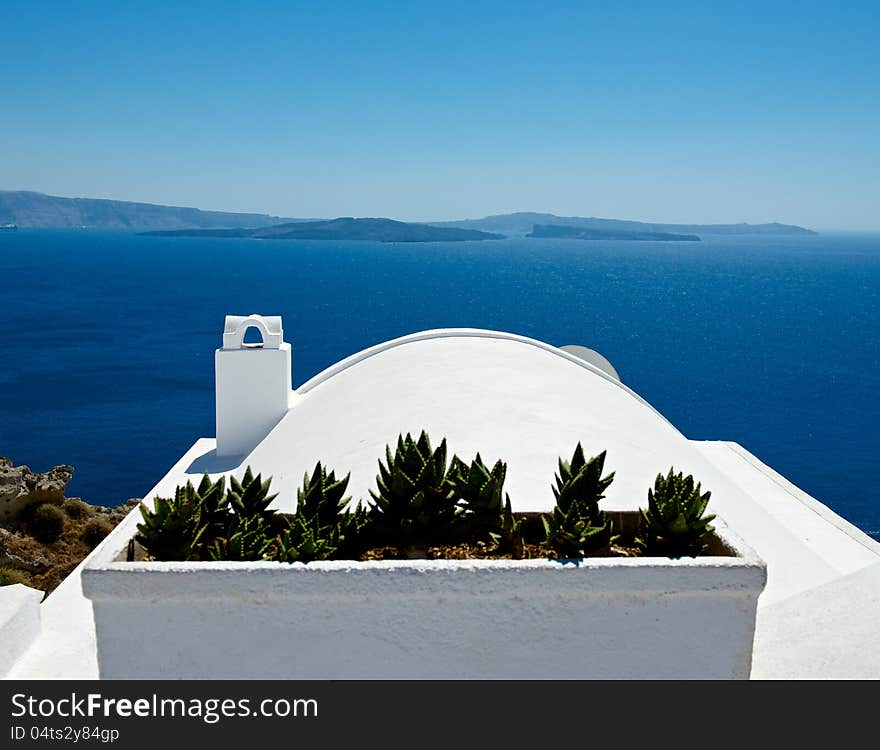 With the white terraces of Santorini offers magnificent views of the sea and the caldera. With the white terraces of Santorini offers magnificent views of the sea and the caldera.