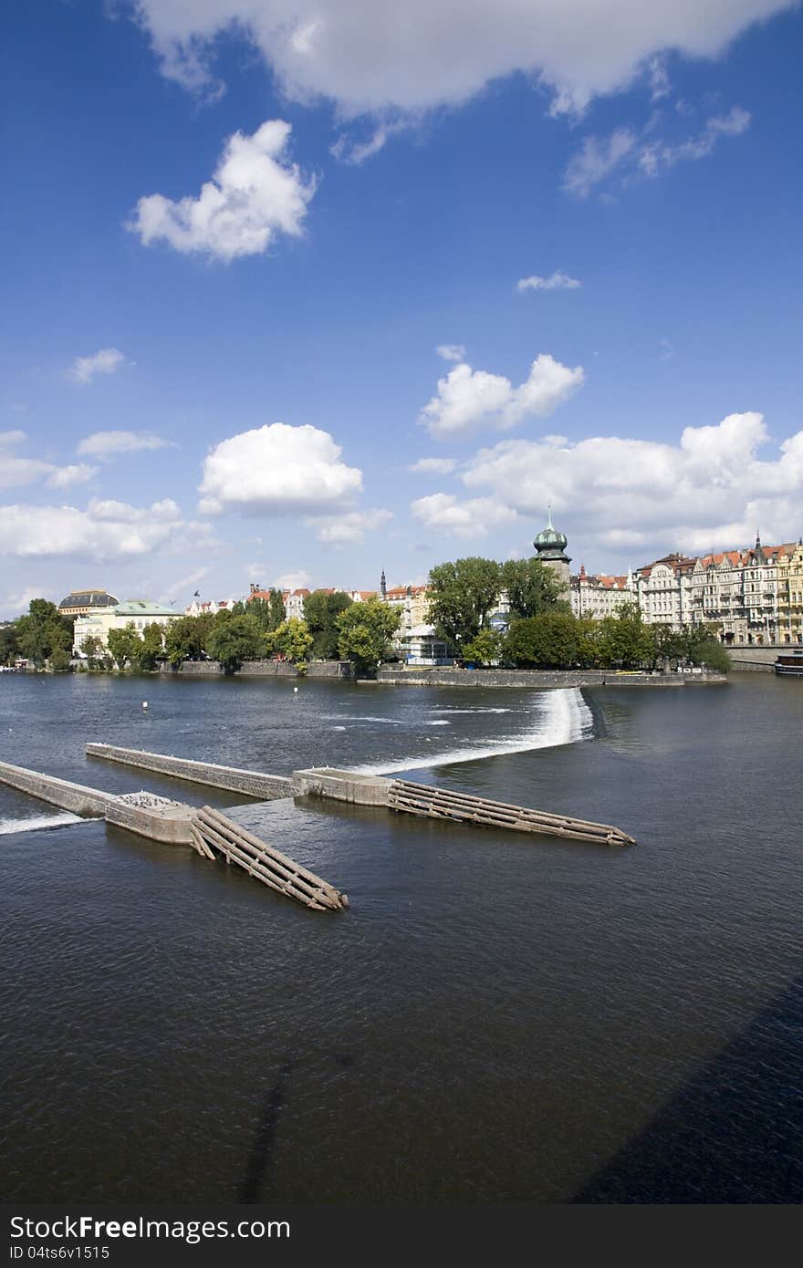 Prague waterfront in the summer with the building manes. Prague waterfront in the summer with the building manes