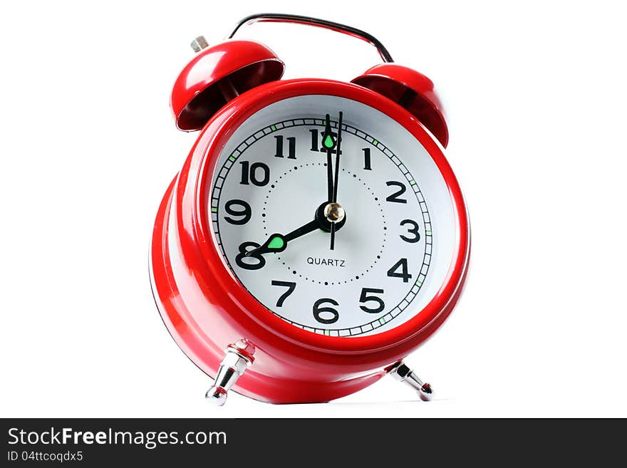 Classic red alarm clock on a white background. Classic red alarm clock on a white background