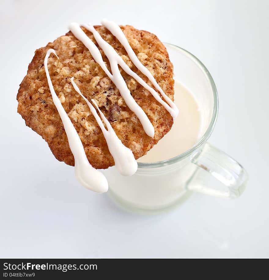 Oat cookie with a glass of milk. Oat cookie with a glass of milk