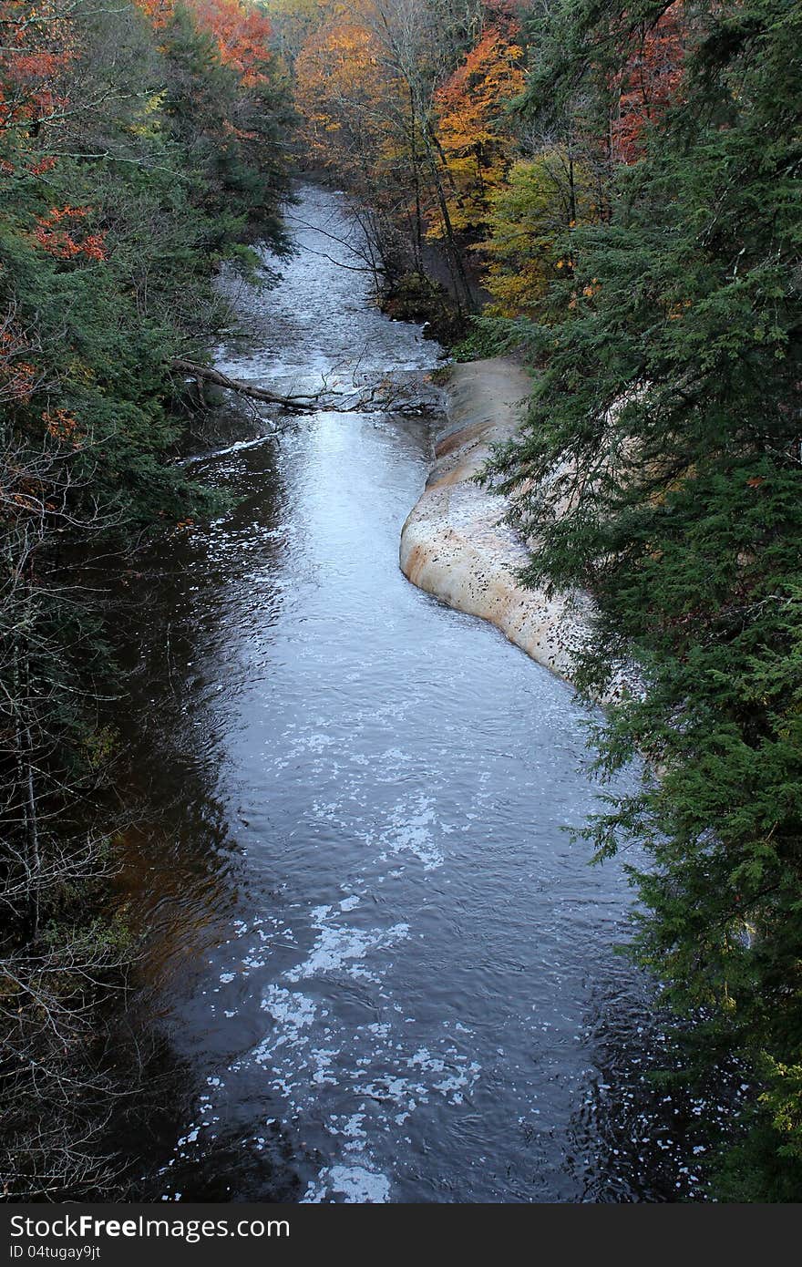 A river running through the colorful woods