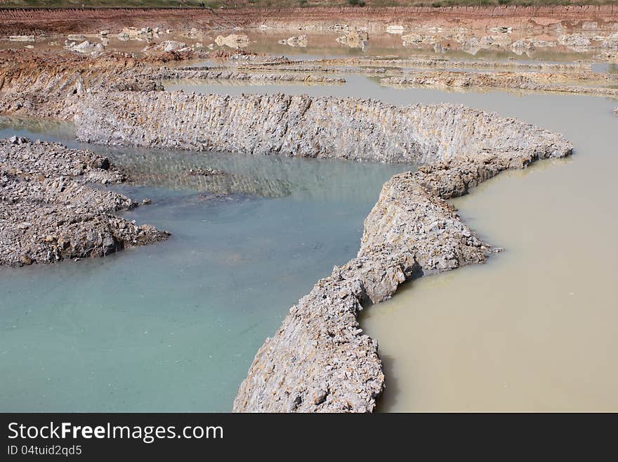 Dam with a large stone in the mine.