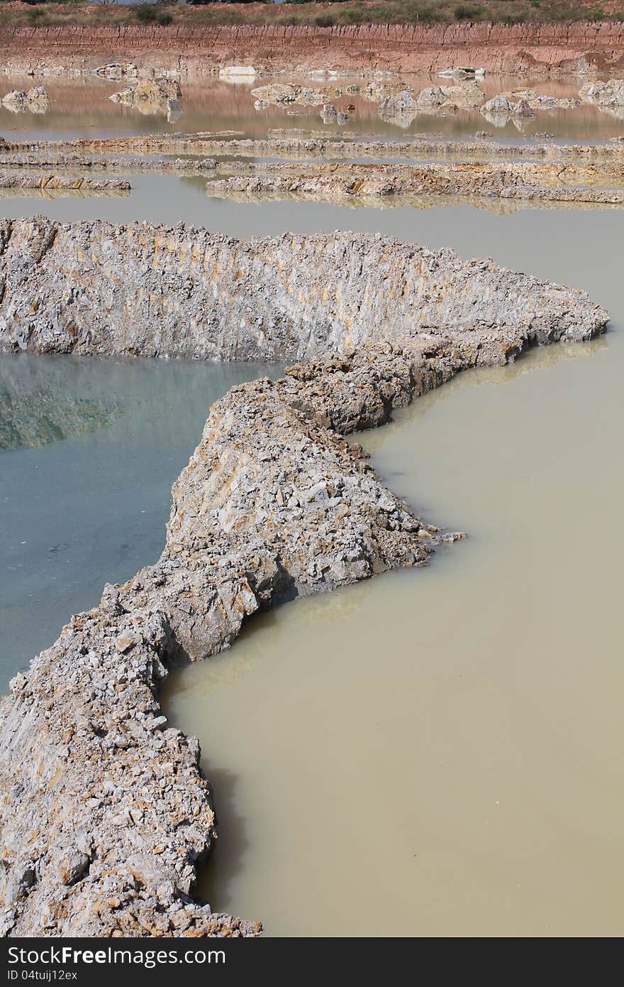 Dam with a large stone in the mine.