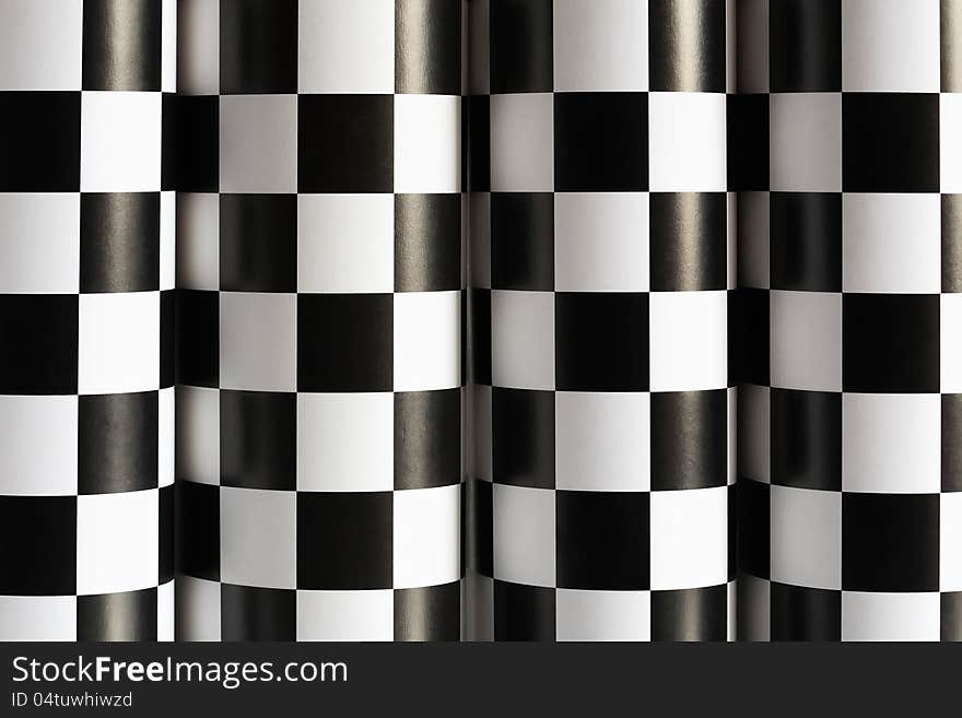 Abstract background made from black and white checkered paper. Abstract background made from black and white checkered paper