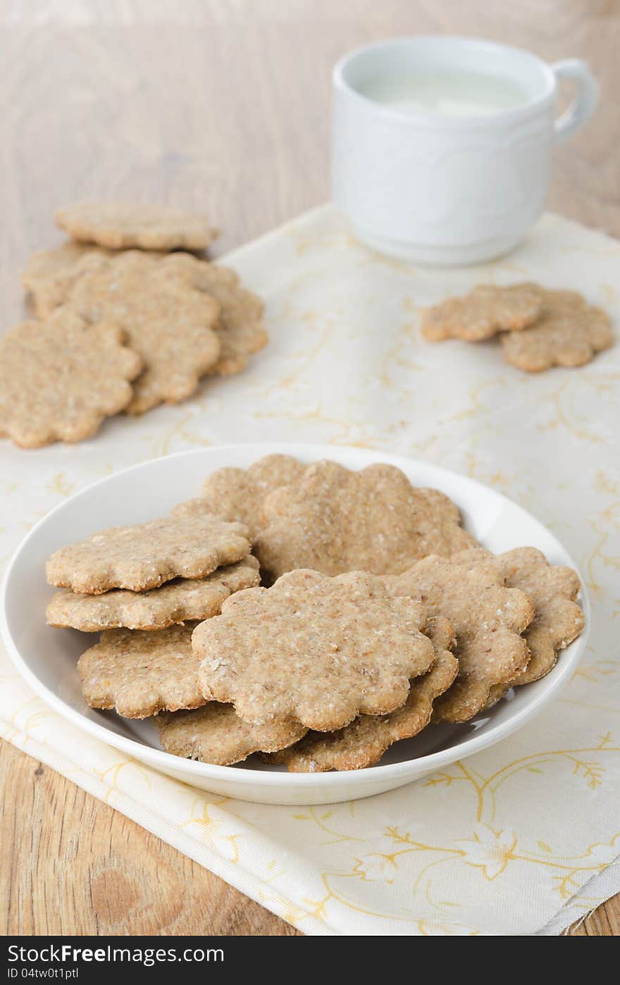 Figured ginger cookies on a plate. Figured ginger cookies on a plate