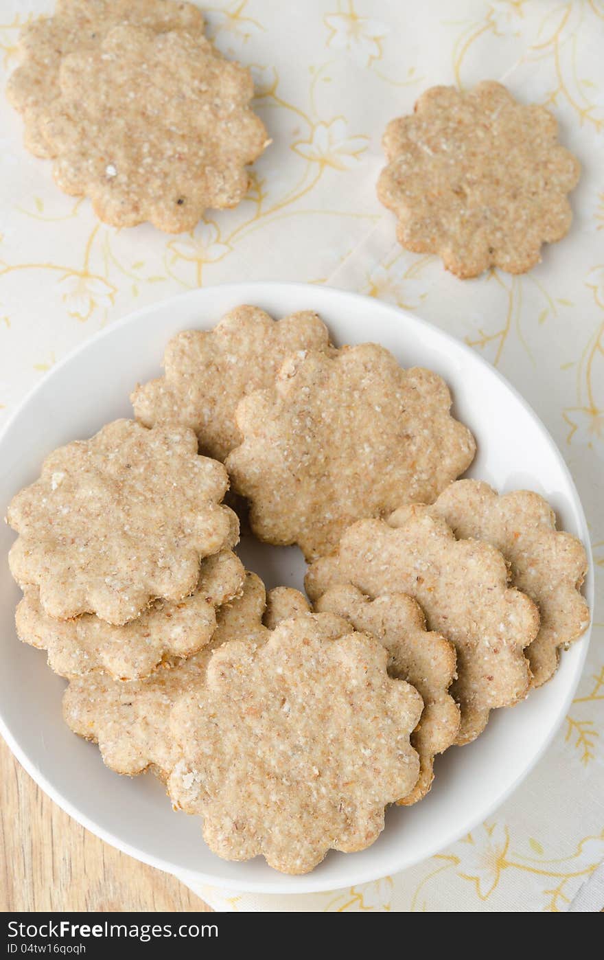 Figured ginger cookies on a plate, top view. Figured ginger cookies on a plate, top view