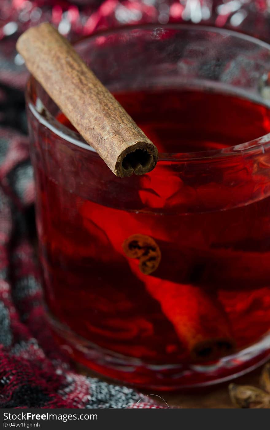 Mulled wine with cinnamon in a glass beaker