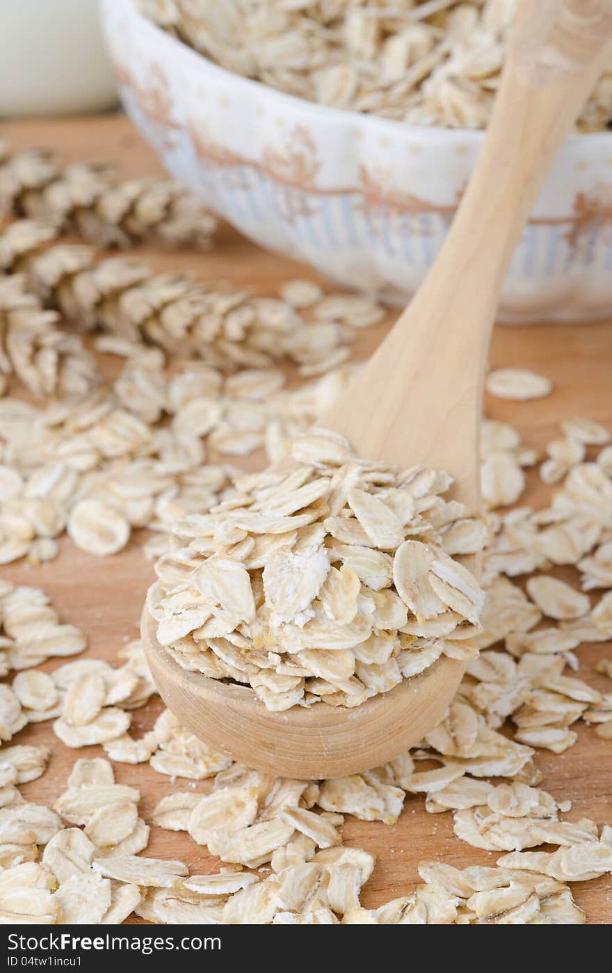 Oatmeal in a wooden spoon