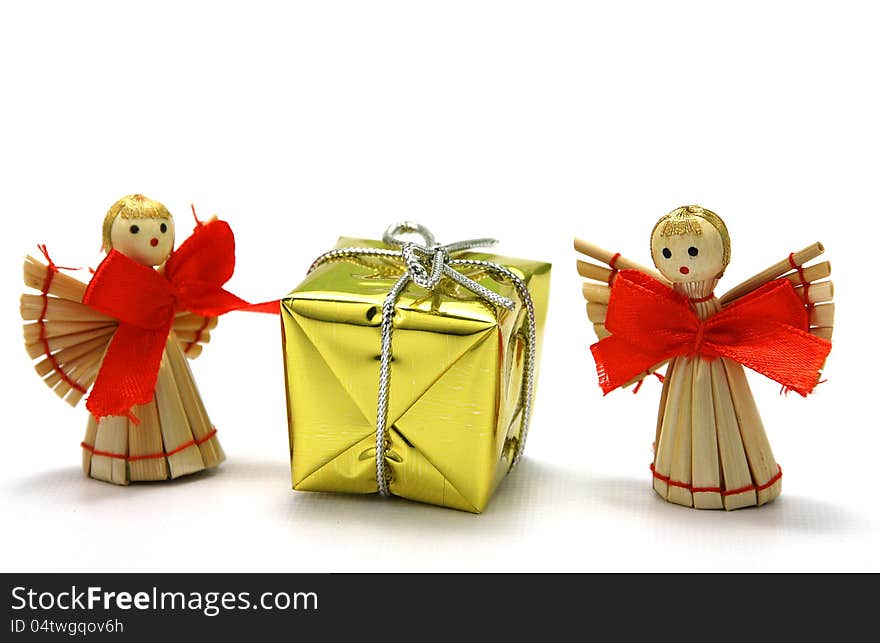 Christmas decoration - wooden angel with a gift. Christmas decoration - wooden angel with a gift