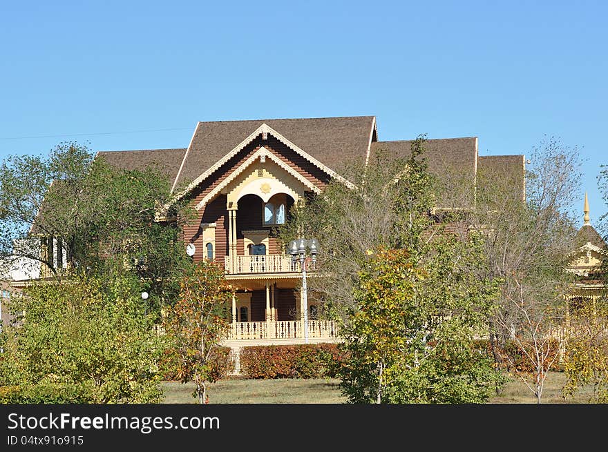 The wooden facade of the building The national village, the city of Orenburg, Southern Ural, Russia