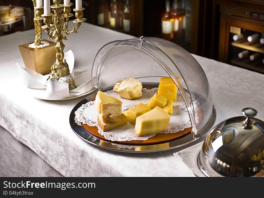 Variety of cheeses on the table the vintage restaurant. Variety of cheeses on the table the vintage restaurant.