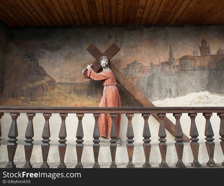 Statue and fresco at base of Piaristen Church in Krem ,Austria. Statue and fresco at base of Piaristen Church in Krem ,Austria