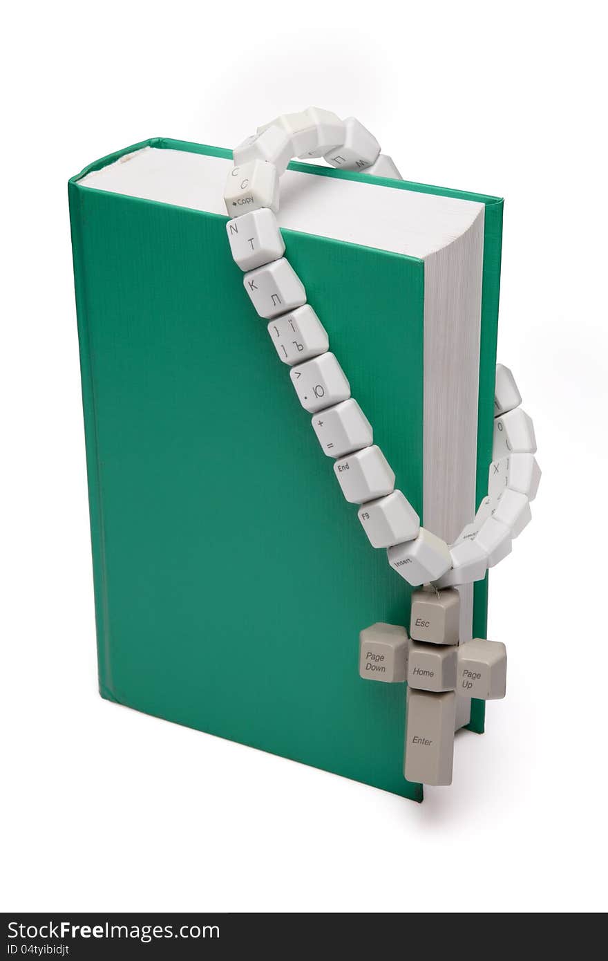 Christian, catholic rosary made from computer keyboard with green book