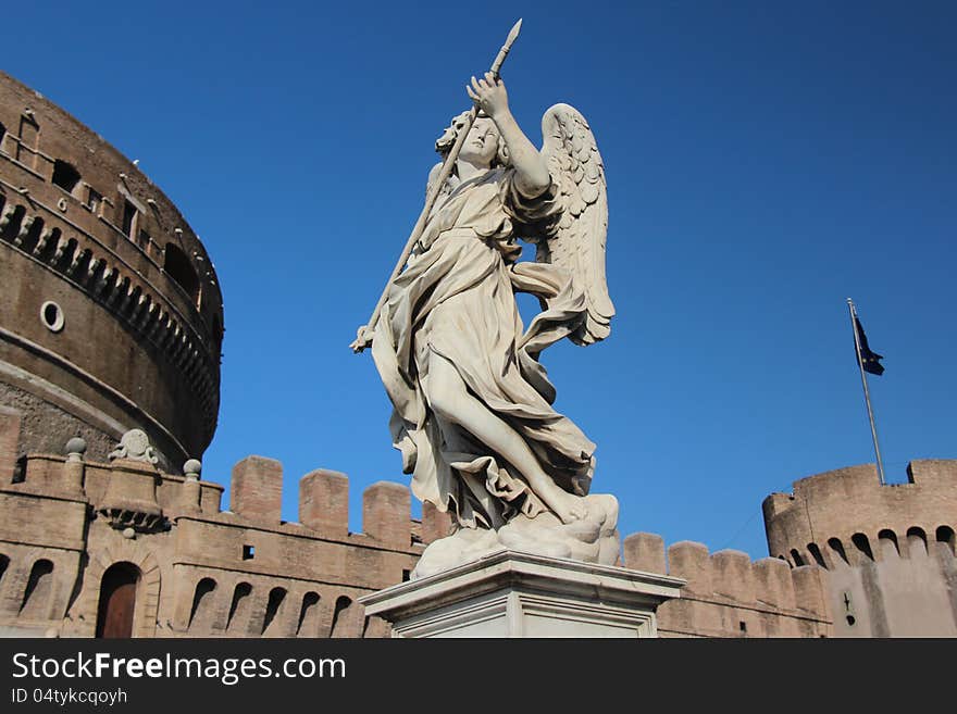 The Mausoleum of Hadrian, usually known as the Castel SantAngelo (English: Castle of the Holy Angel), is a towering cylindrical building in Parco Adriano, Rome, Italy. It was initially commissioned by the Roman Emperor Hadrian as a mausoleum for himself and his family. The building was later used by the popes as a fortress and castle, and is now a museum. The popes converted the structure into a castle, beginning in the 14th century; Pope Nicholas III connected the castle to St. Peters Basilica by a covered fortified corridor called the Passetto di Borgo. The fortress was the refuge of Pope Clement VII from the siege of Charles Vs Landsknechte during the Sack of Rome (1527), in which Benvenuto Cellini describes strolling the ramparts and shooting enemy soldiers. The Mausoleum of Hadrian, usually known as the Castel SantAngelo (English: Castle of the Holy Angel), is a towering cylindrical building in Parco Adriano, Rome, Italy. It was initially commissioned by the Roman Emperor Hadrian as a mausoleum for himself and his family. The building was later used by the popes as a fortress and castle, and is now a museum. The popes converted the structure into a castle, beginning in the 14th century; Pope Nicholas III connected the castle to St. Peters Basilica by a covered fortified corridor called the Passetto di Borgo. The fortress was the refuge of Pope Clement VII from the siege of Charles Vs Landsknechte during the Sack of Rome (1527), in which Benvenuto Cellini describes strolling the ramparts and shooting enemy soldiers.