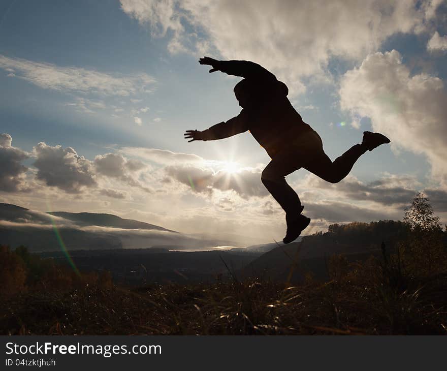 Silhouette man jumping