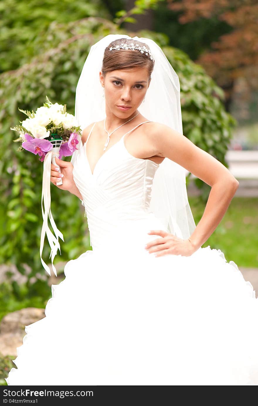 Beautiful bride with flower outdoor