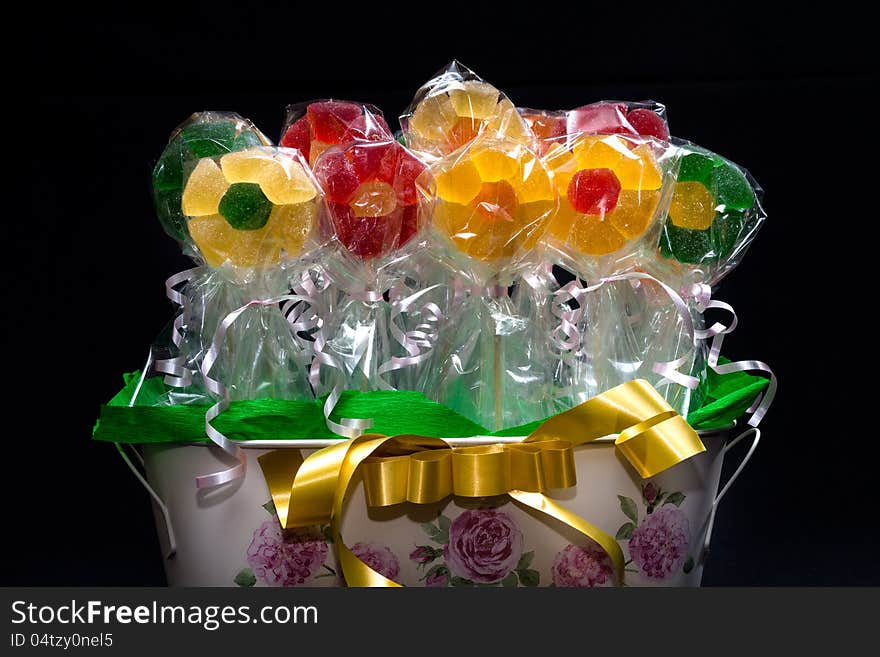 Flowers made of gumdrops in a flowerpot. Flowers made of gumdrops in a flowerpot