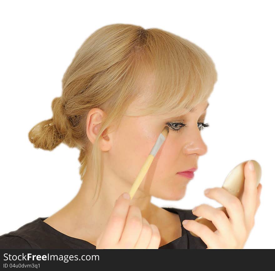 Young Beautiful Woman With A Make-up Brush