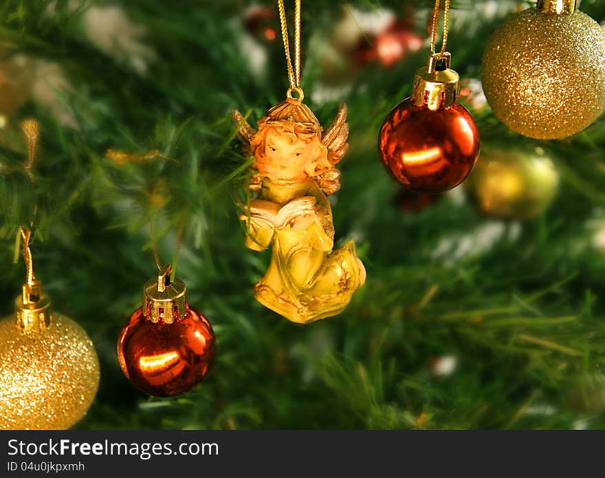 Christmas decoration - wooden angel on the christmas tree. Christmas decoration - wooden angel on the christmas tree