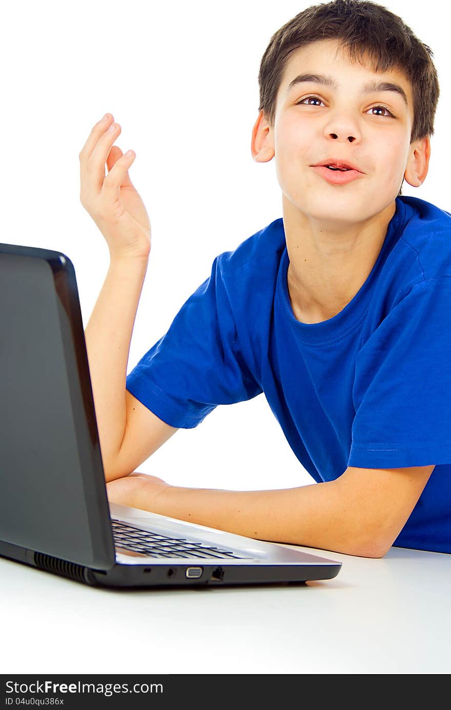 Boy teaches lessons at the computer. Boy teaches lessons at the computer