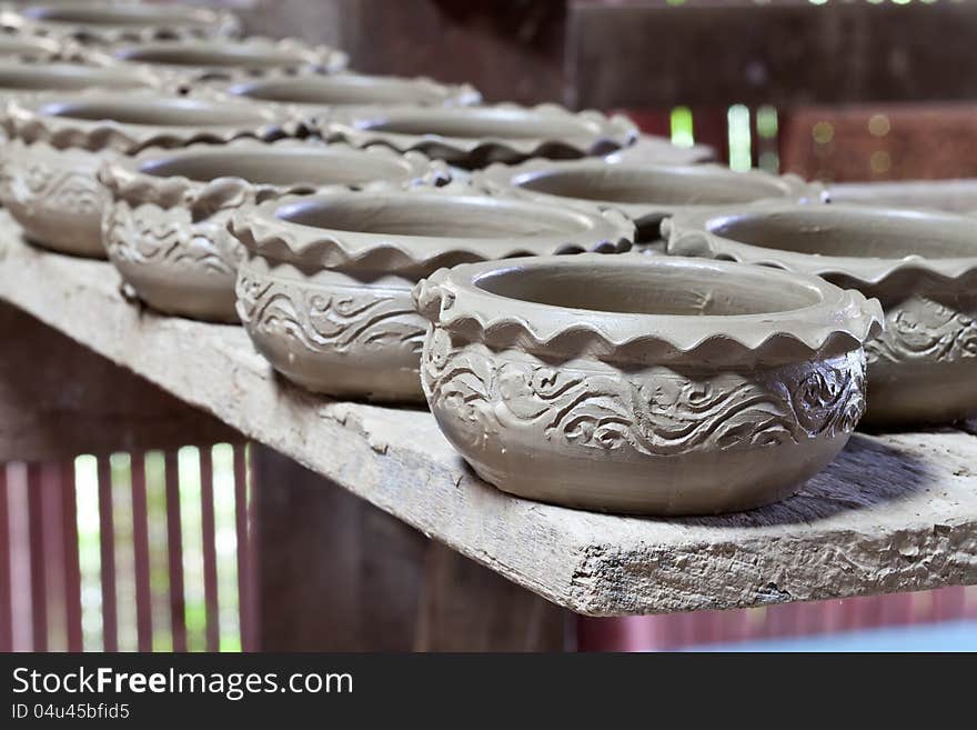 Large group of clay pots spread