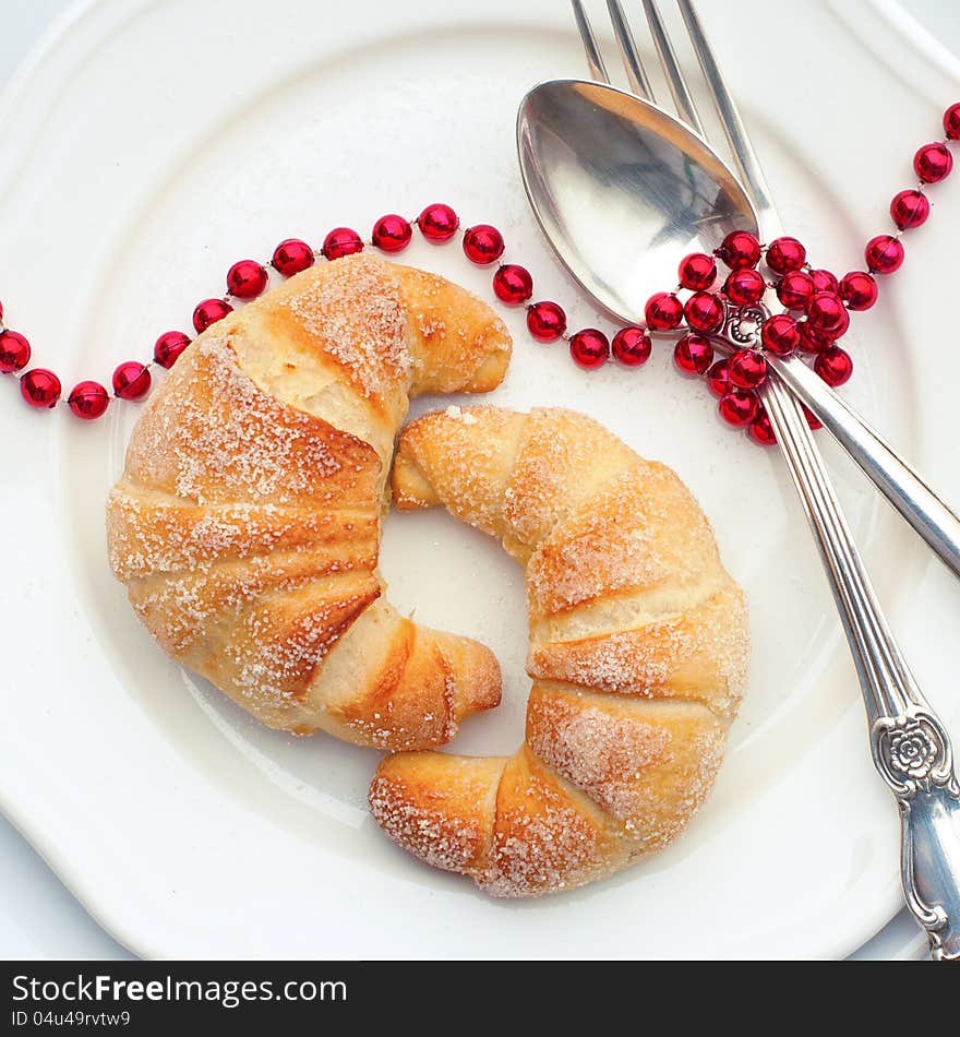 Croissant On A White Plate