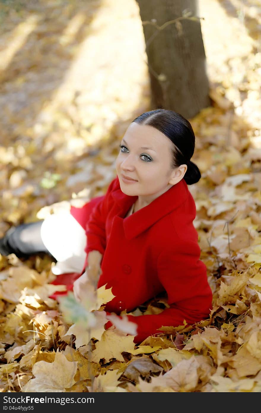 Cute Girl enjoys the freshness of autumn