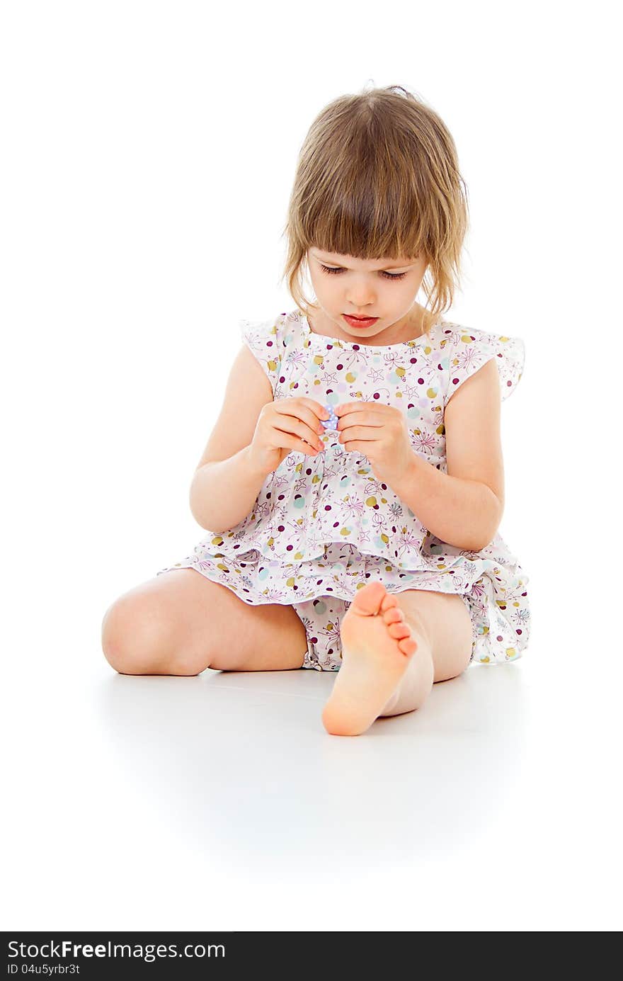 Beautiful little girl in a dress