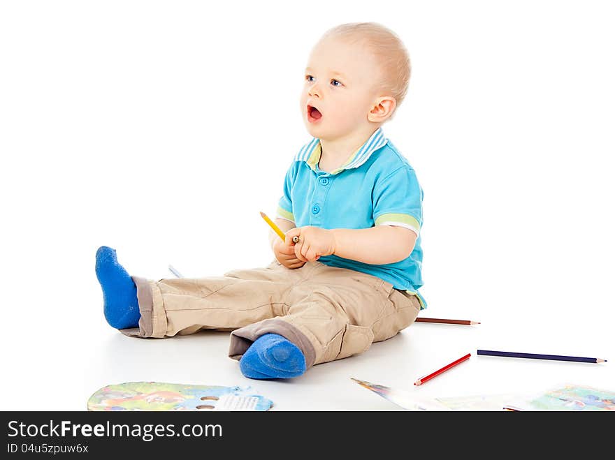 Beautiful little boy with pencil