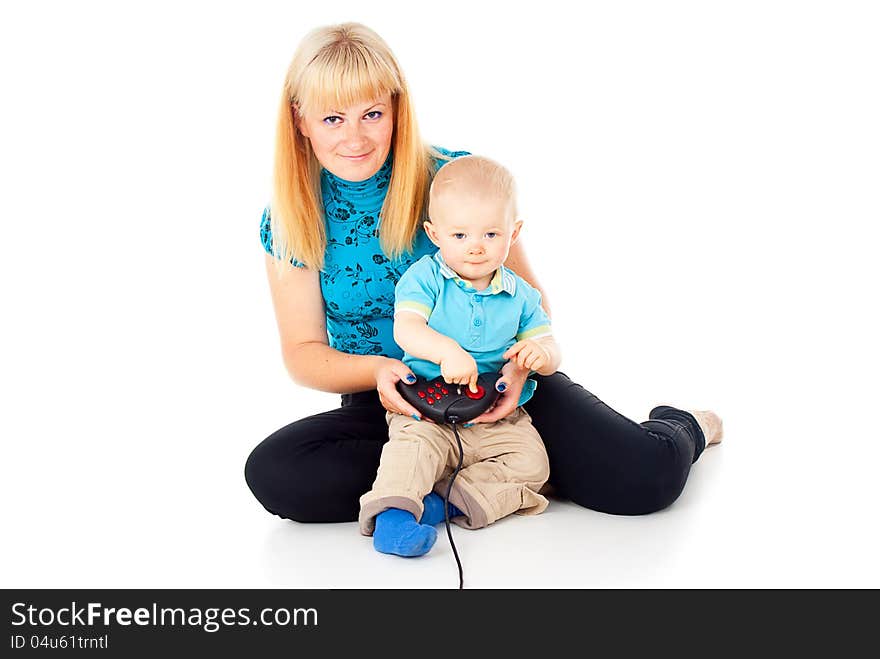 Mother with a child playing video games with a joystick