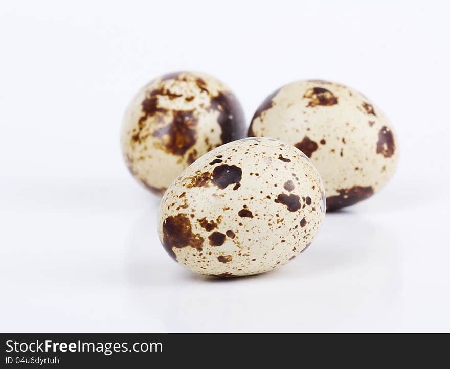 Quail eggs  on white  background