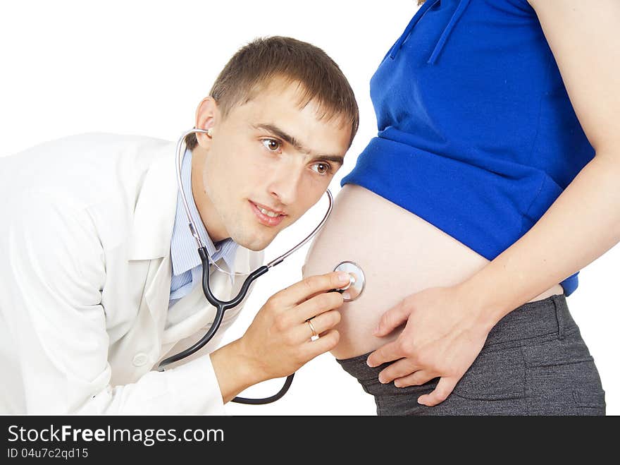 Doctor listening to fetal heart. Doctor listening to fetal heart