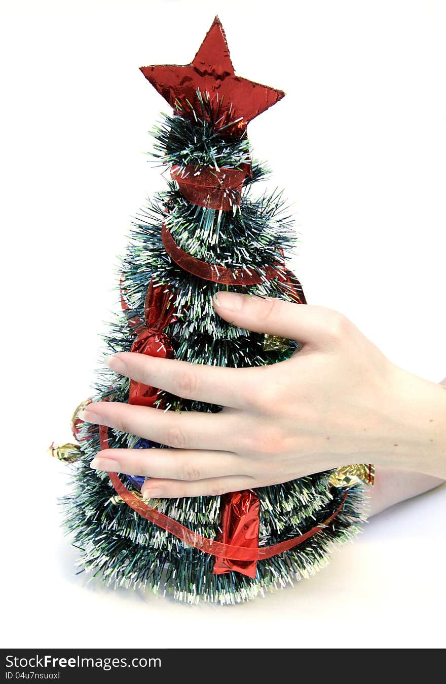 Festively decorated Christmas tree gift in hand. Festively decorated Christmas tree gift in hand