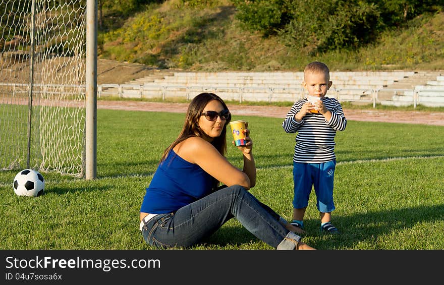 Mum And Son Playing Soccer