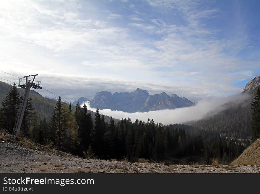 Morning fog in the mountains of the Dolomites