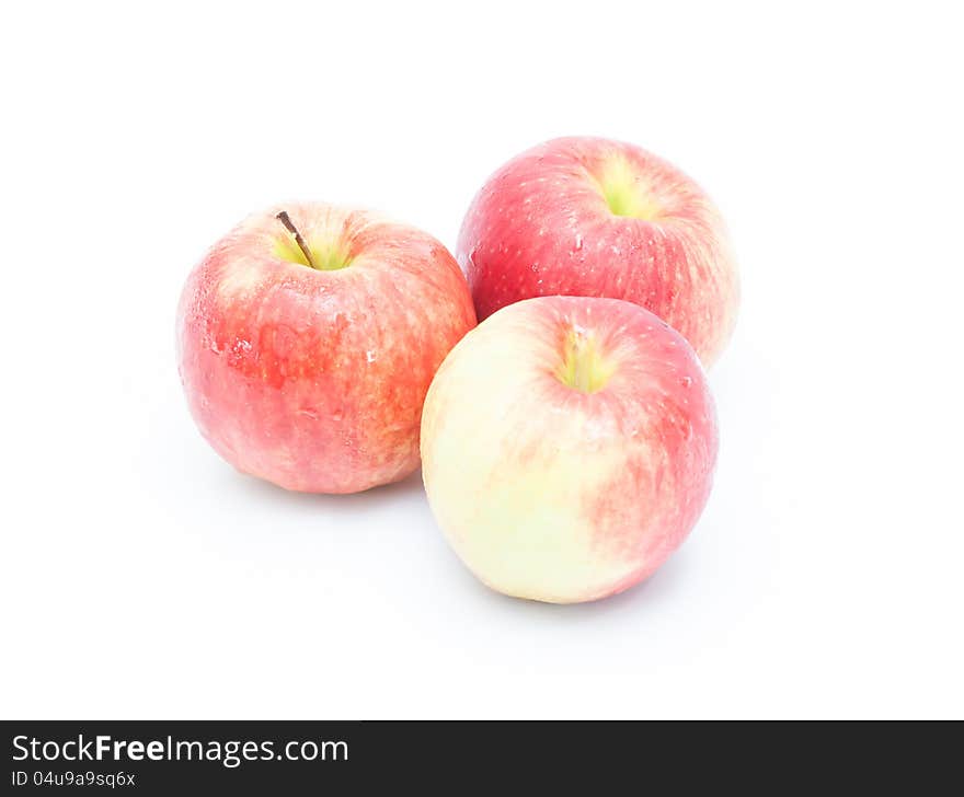 Three ripe juicy red apples. on white background