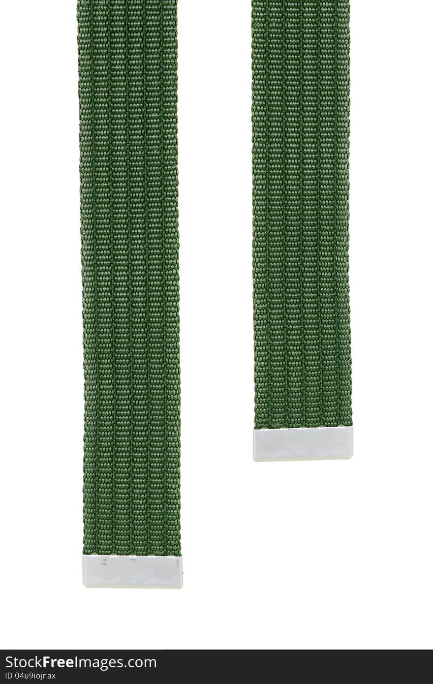 Green fabric belt on a white background. Fashion, accessory