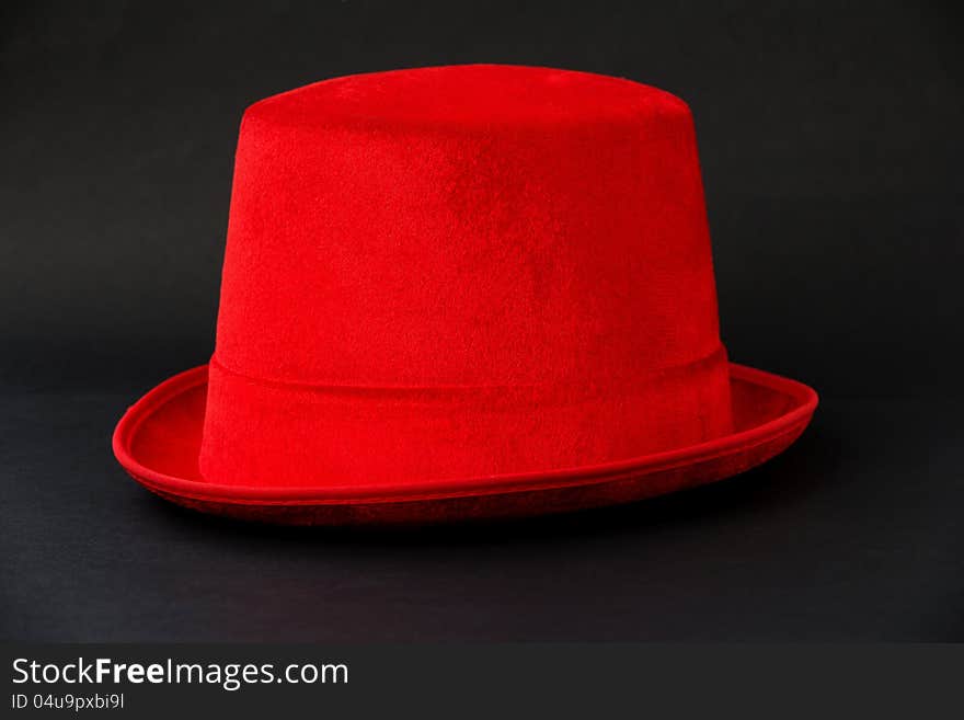 Red hat on black background