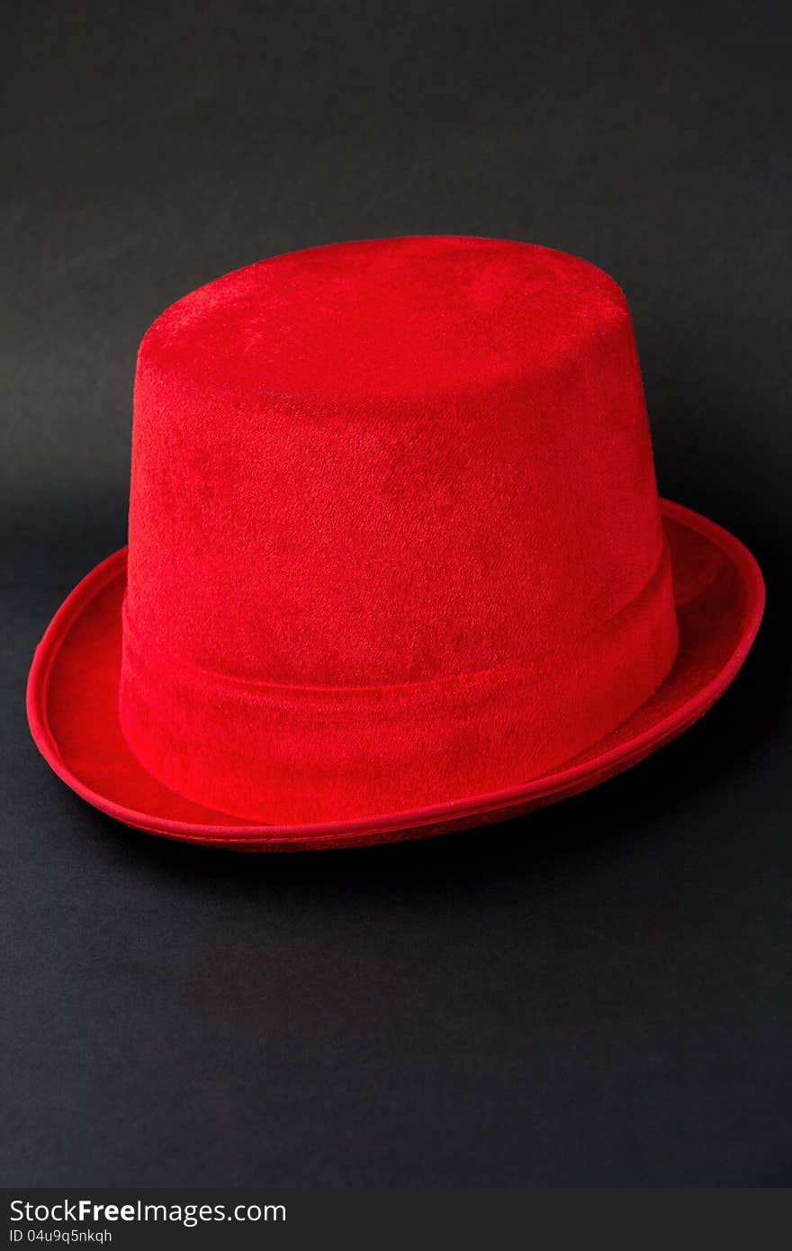 Red hat on black background