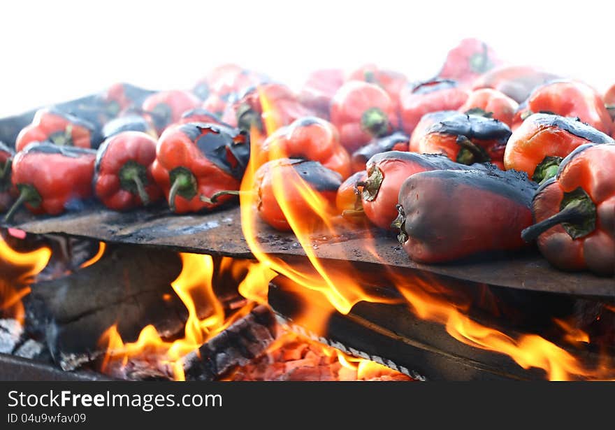 Some red peppers on fire preparing for canned. Some red peppers on fire preparing for canned