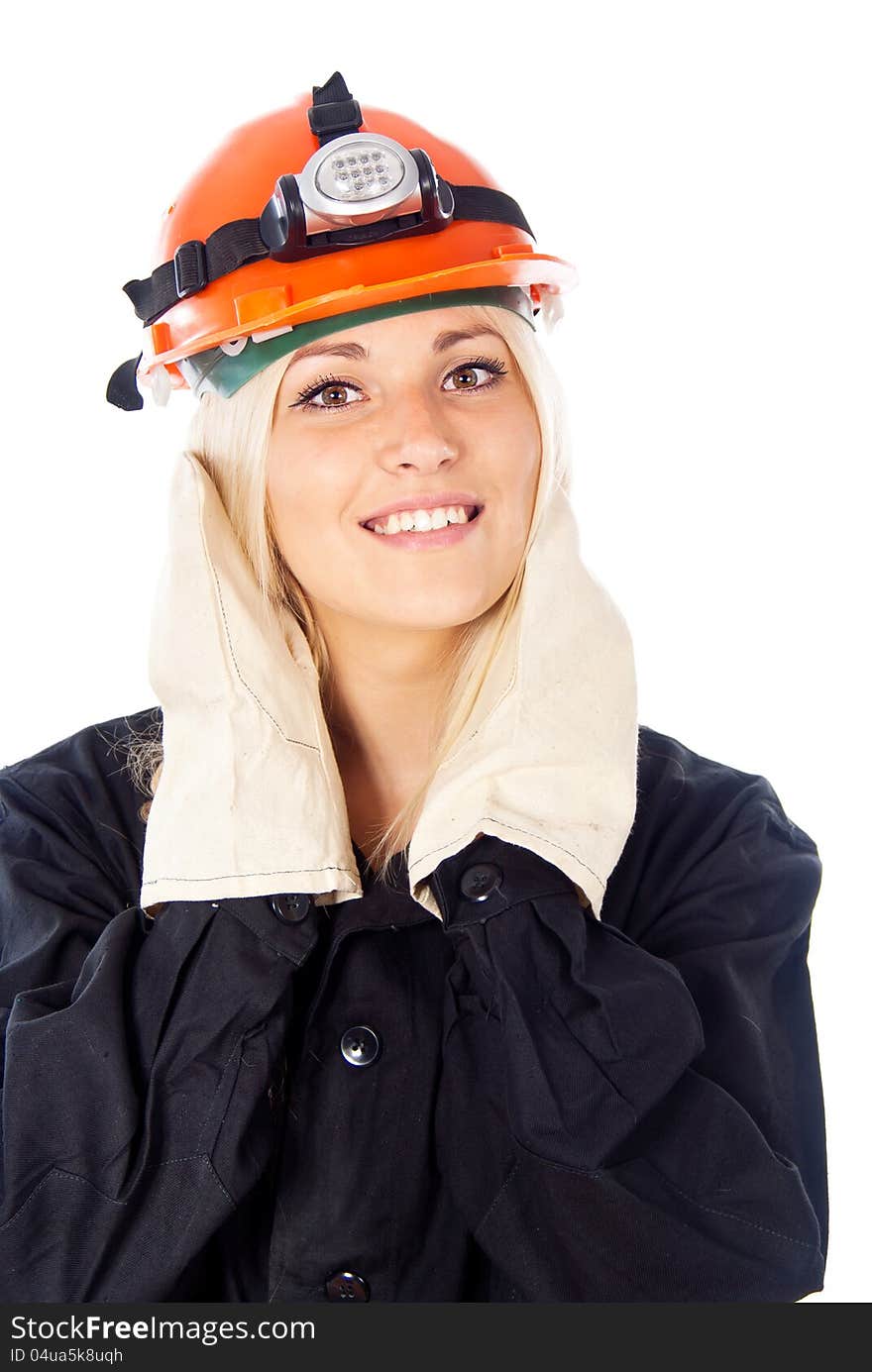 Happy girl in a construction helmet isolated on white background