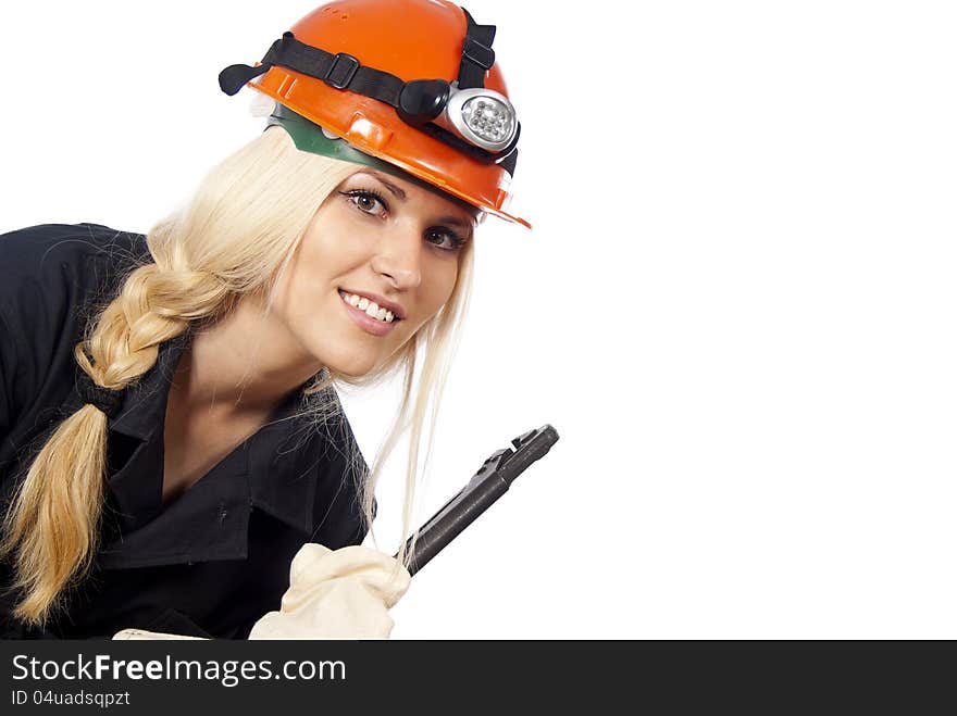 Happy girl in a helmet looks isolated on white background