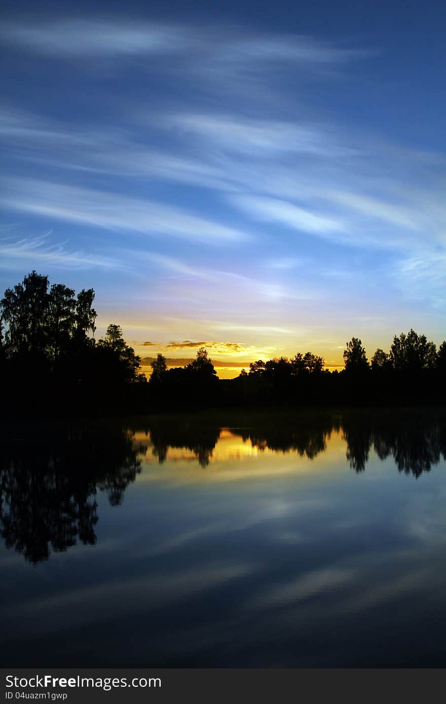 Sunrise by the lake called Barken, in Sweden, Söderbärke