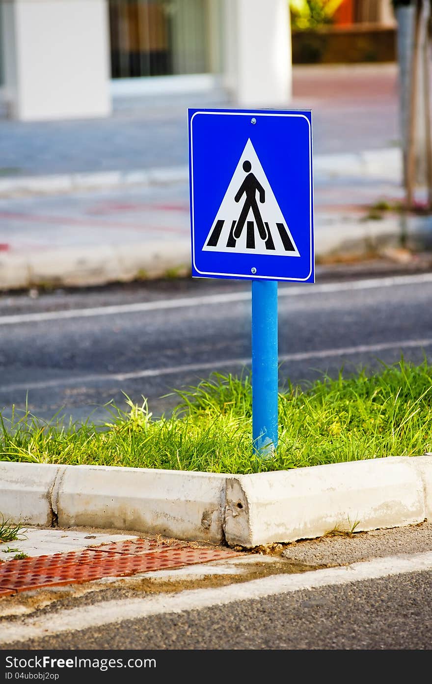 Sign a pedestrian crossing.