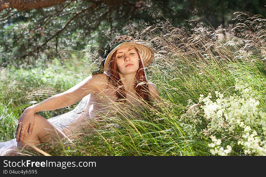 Young woman  on natural background