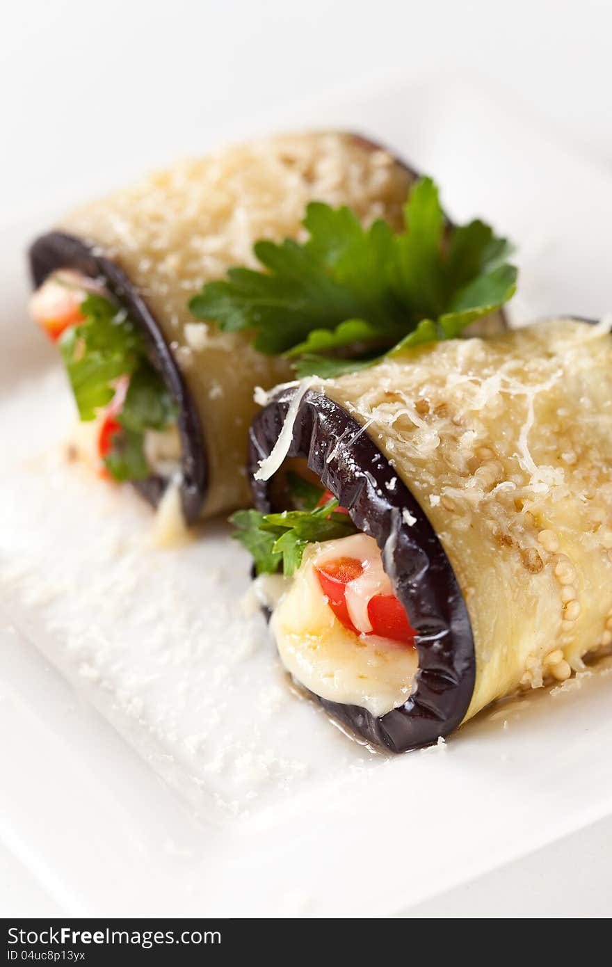 Eggplant rolls with vegetables and cheese