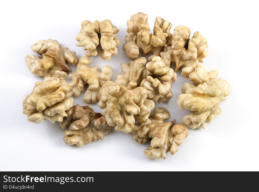 Some walnuts on white background.