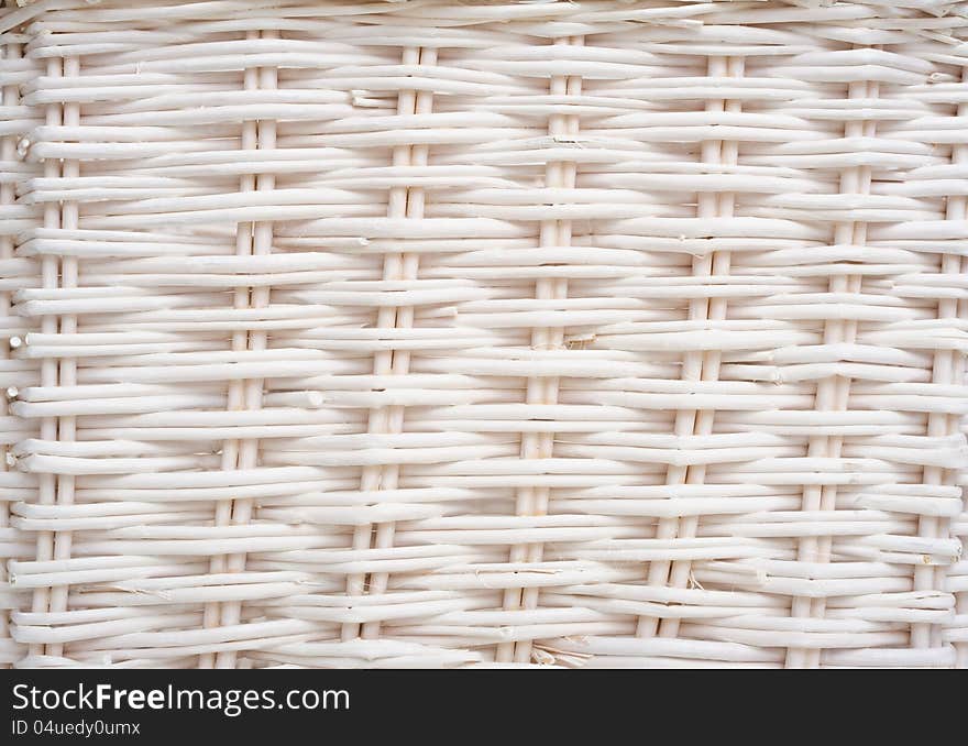 Closeup of wicker texture, painted in white wooden material with horizontal composition. Closeup of wicker texture, painted in white wooden material with horizontal composition