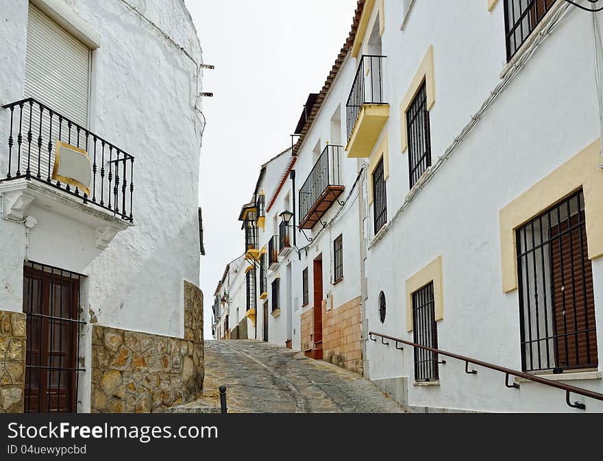 Steep narrow street in the ancient Ronda